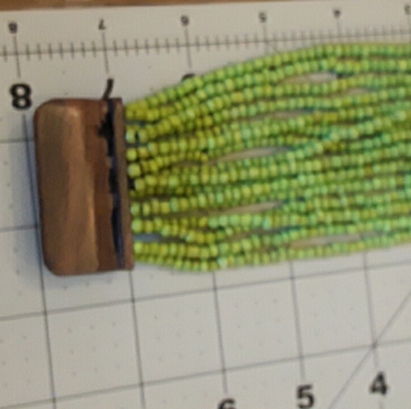 Bracelet with wood clasp and rows of beads - Picture 3 of 3